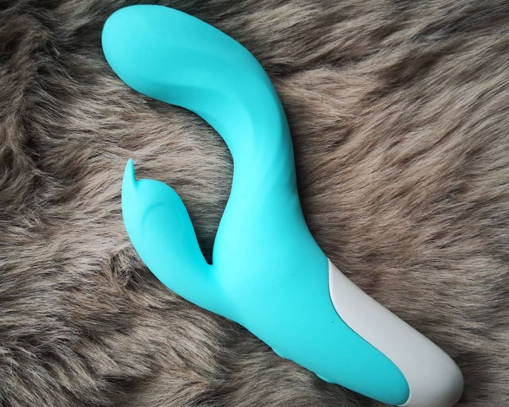 blue vibrator on the blanket