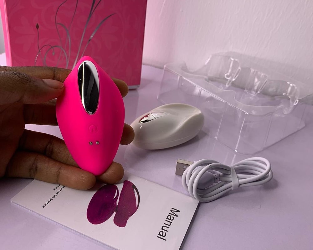 pink vibrator in the hand