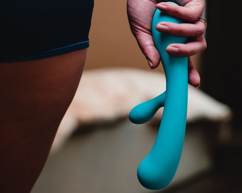 woman with blue vibrator